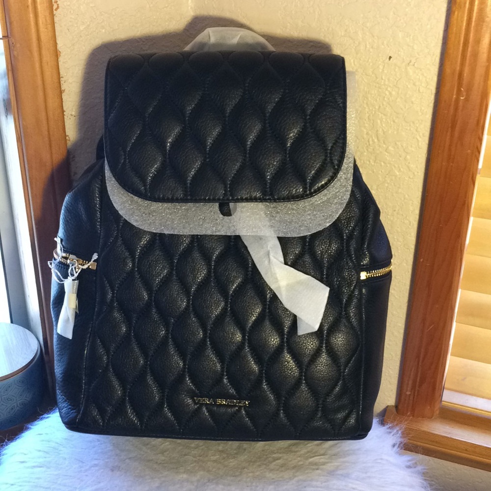 Vera Bradley black leather quilted backpack.
